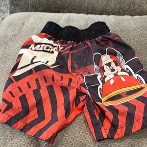 Red and black Mickey Mouse swimming trunks size 24 months